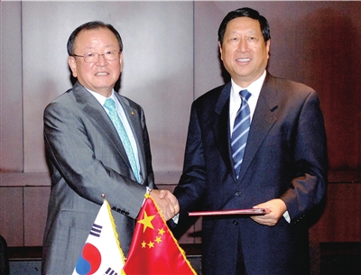 中韩举行第八届经济部长会议