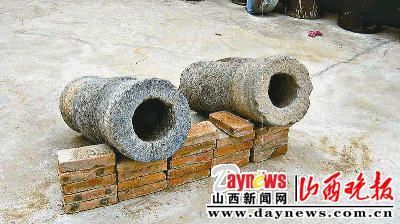 阳高一磨坊外挖出两门明代石炮(图)