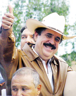 新华社发   ■洪都拉斯临时政府浑然不觉   ■塞拉亚现藏身巴西使馆"