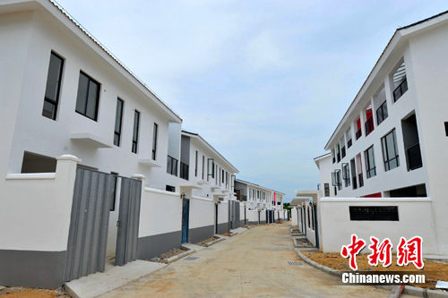 走进海南万宁"华润希望小镇"见识失地农民新居