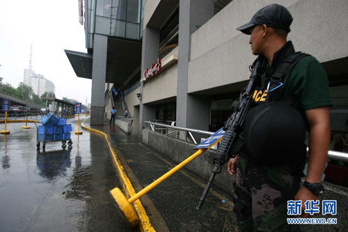 3月29日,在菲律賓馬尼拉,警察在現場警戒.