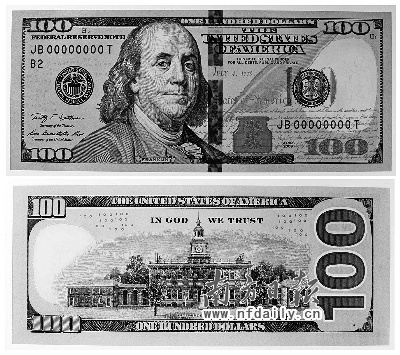 新华社发美国21日发布新版100美元面值纸钞,借助3d效果等高技术防伪