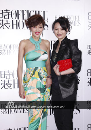 孟广美与《时装lofficiel hommes》杂志出版人苏红小姐合影