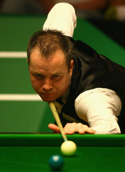 的一场1/8比赛中,卫冕冠军苏格兰男巫约翰-希金斯9比13不敌威尔士选手