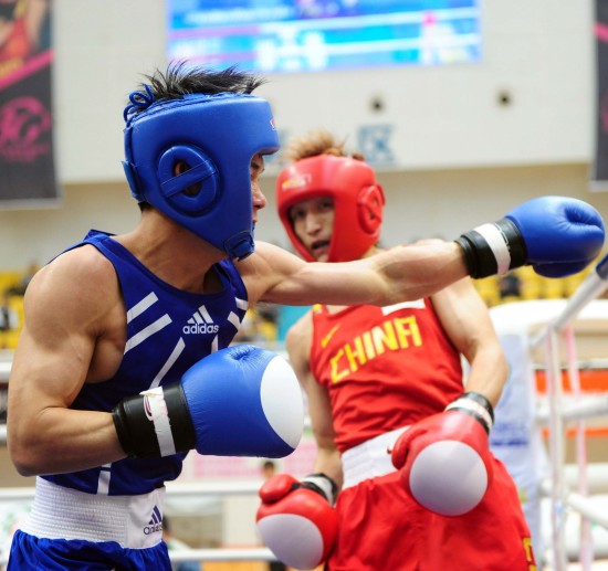 图文-第11届全运会拳击预赛闭幕 黎家赵一击落空